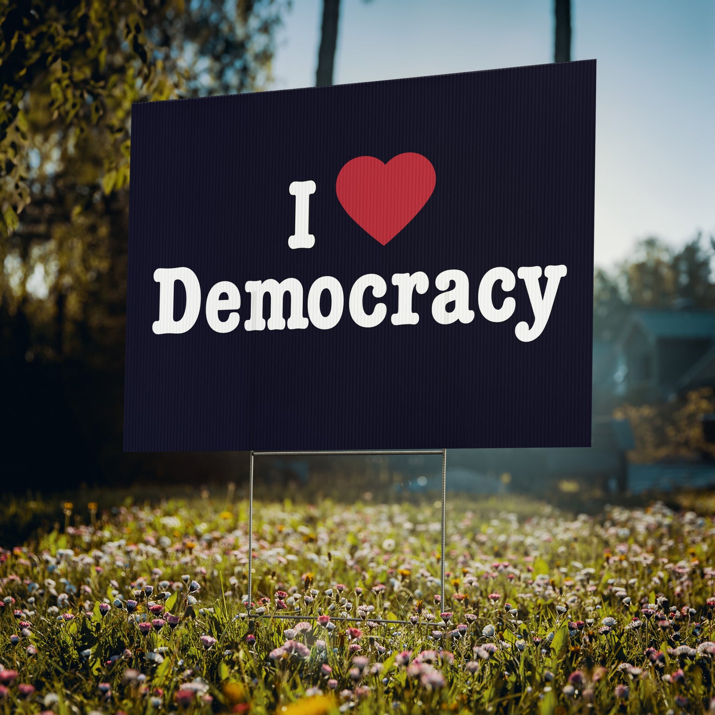 Yard sign saying "I love democracy" place outside